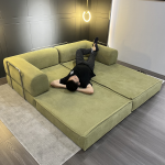 Teddy Compressed Sofa Bed opens up to become a bed